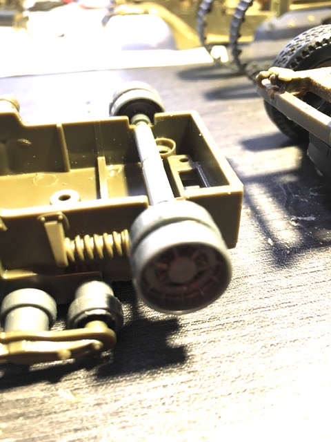 This is how the idler works on the Testers Halftrack, I used this method on the Tamiya's idler wheels