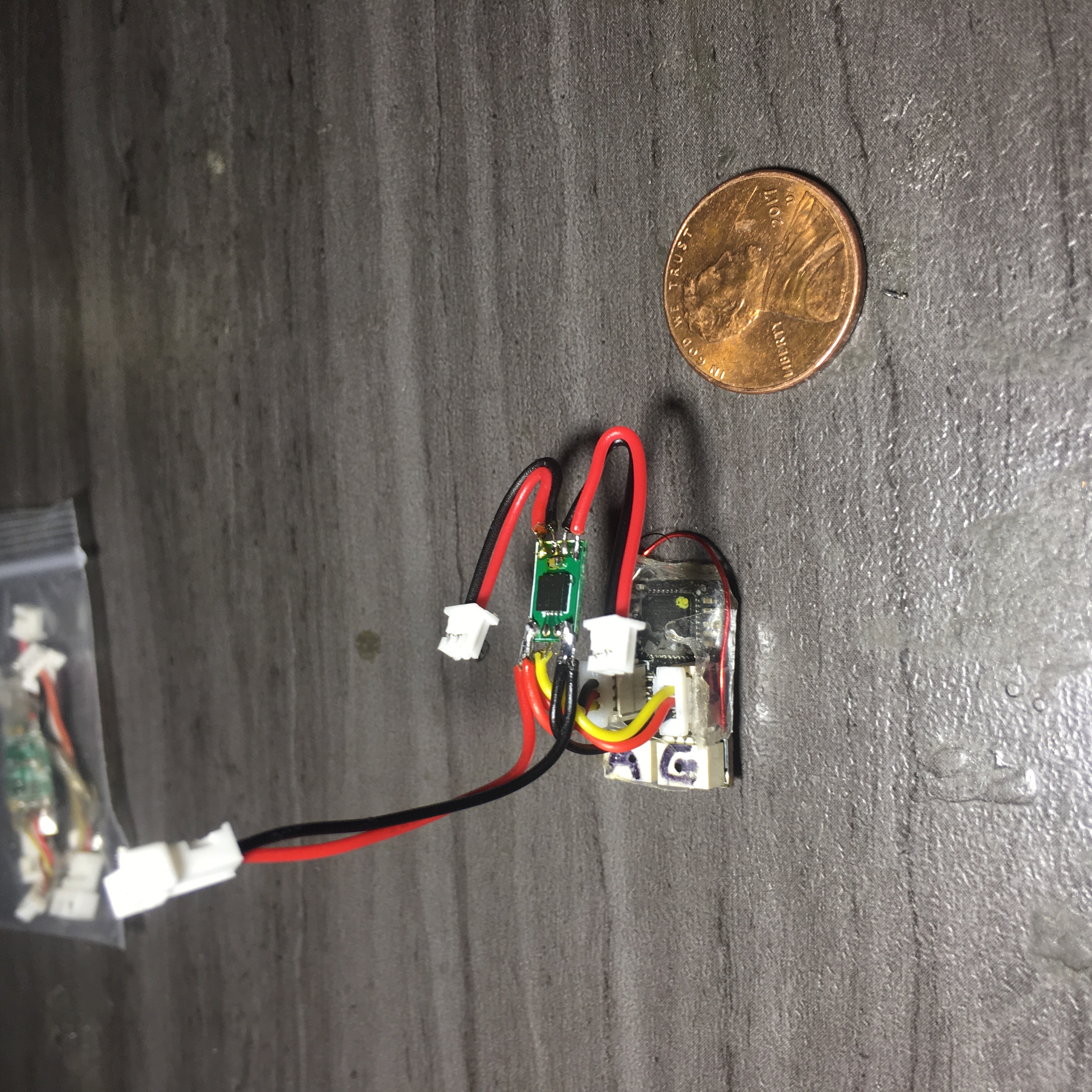 Here is one of those tiny dual ESC's plugged into a RX42 Telemetry receiver. This one just wired and has not had final wire forming yet. I will soon wire another this time WITHOUT mixer and show pictures of it stand alone.