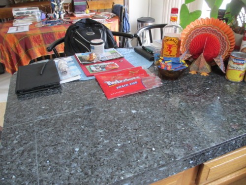 Kitchen counters where I am kindly allowed to do most of the major work as long as I straighten up after myself.   Has a skylight overhead for good light.