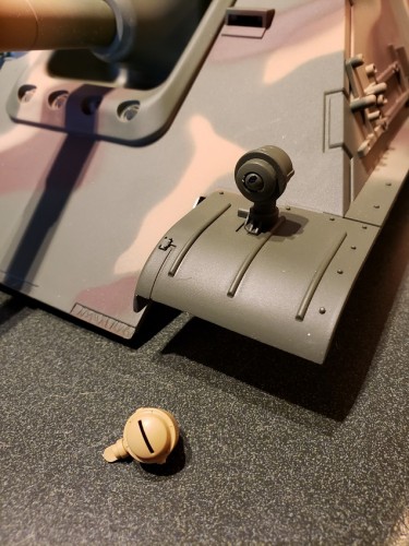 HL Frog Eye headlight housing and replacement Tamiya piece.jpg