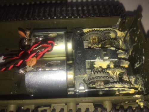 I bought this used tank on ebay just to get this rare all metal gearbox. These things can not be beat and mount in a lot of Tamiya models without mods to the model. There are about 5 different gearboxes. The 5 types have differences in width and length of the axles, mounting screw location, and motor type (round or square 130)