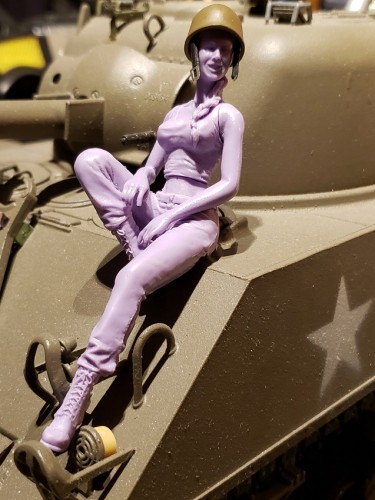 Helmet uses brass bits and leather cut to size for straps and also interior padding to make it fit the figure securely.jpg