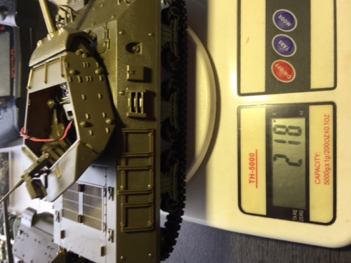 218 grams with Tamiya gearboxes.