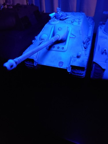 The Jagdtiger sitting next to the Jagdpanther is lit only vaguely by the blue glow effect..jpg