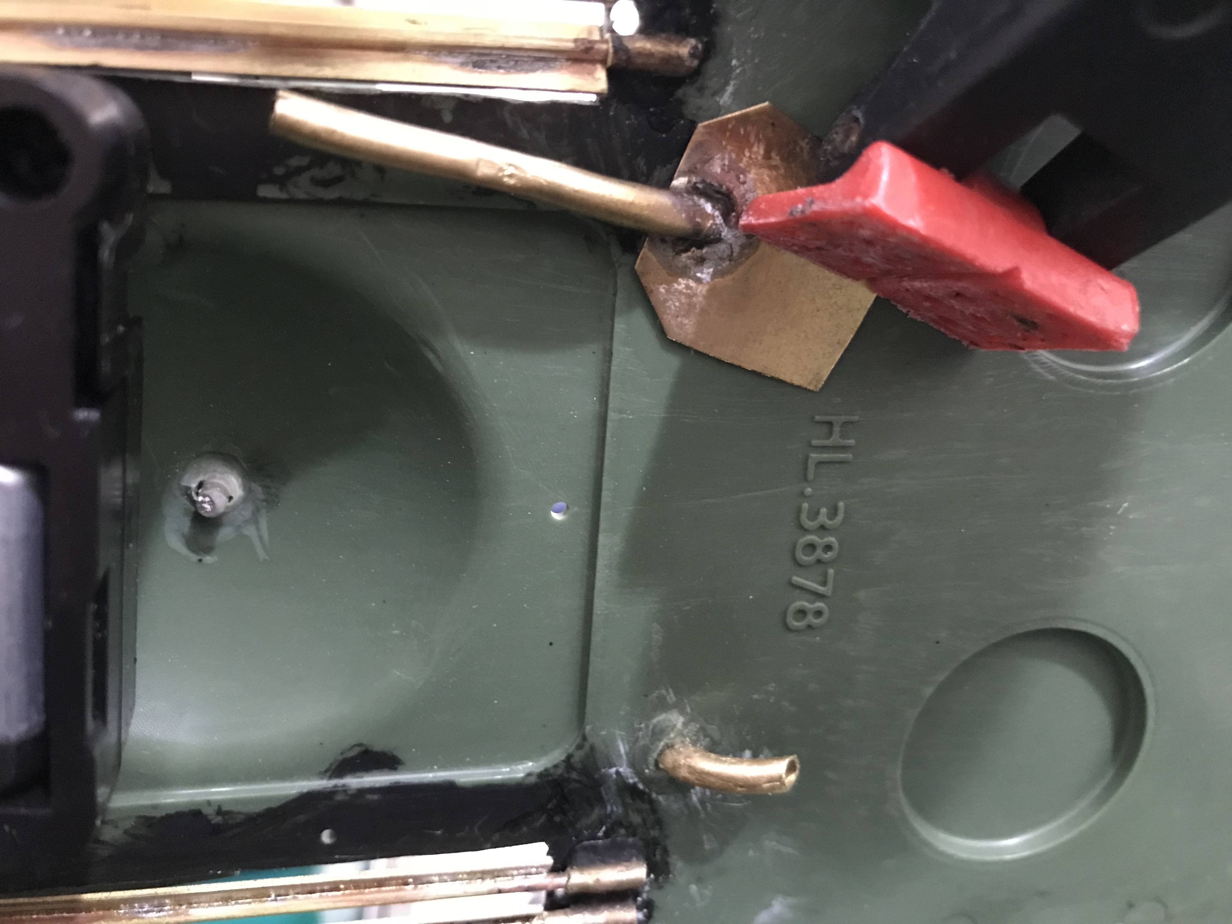 Right over top of the motor