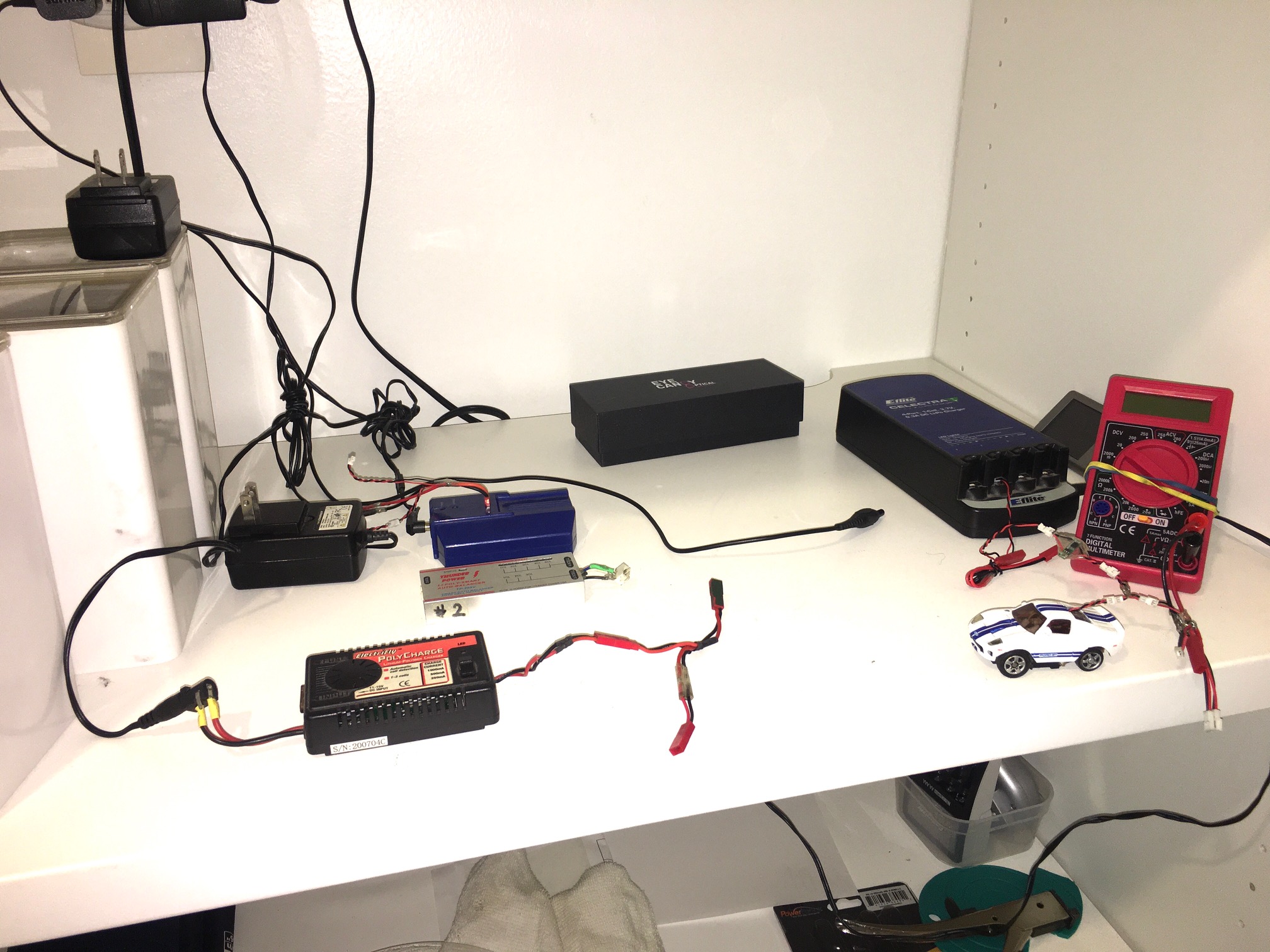 Here is a closet Battery charge station. Close the door when not using to make wife happy.