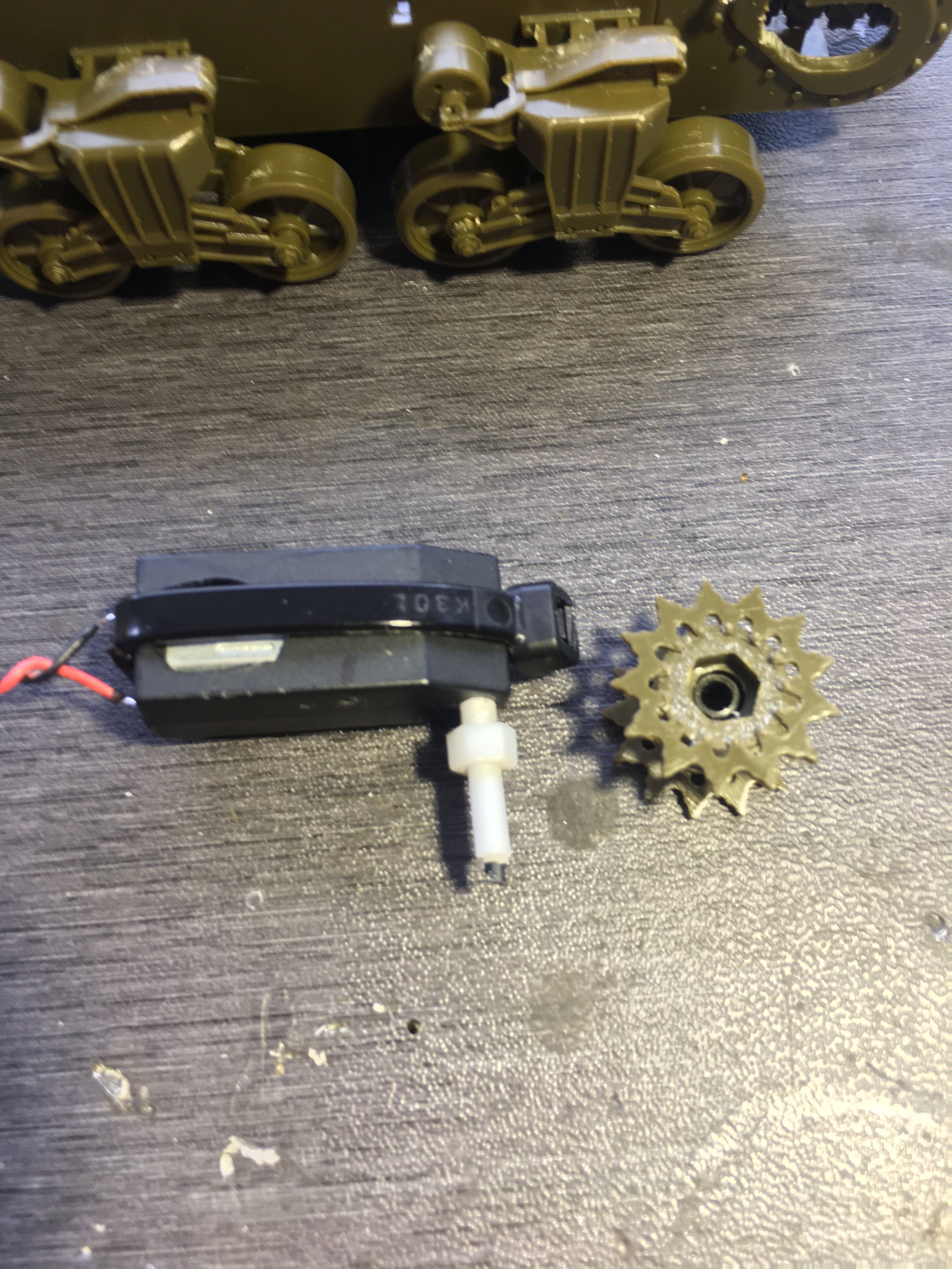 Stock Tamiya Sprocket fits this custom axle