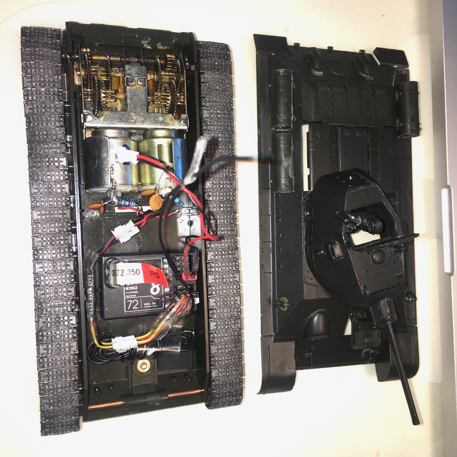 Vintage aircraft radio gear with a modern twin ESC with mixing. &quot;34&quot; stamping visible on the gearbox. You can also see upgrade brass pinion gears on the motor shafts.