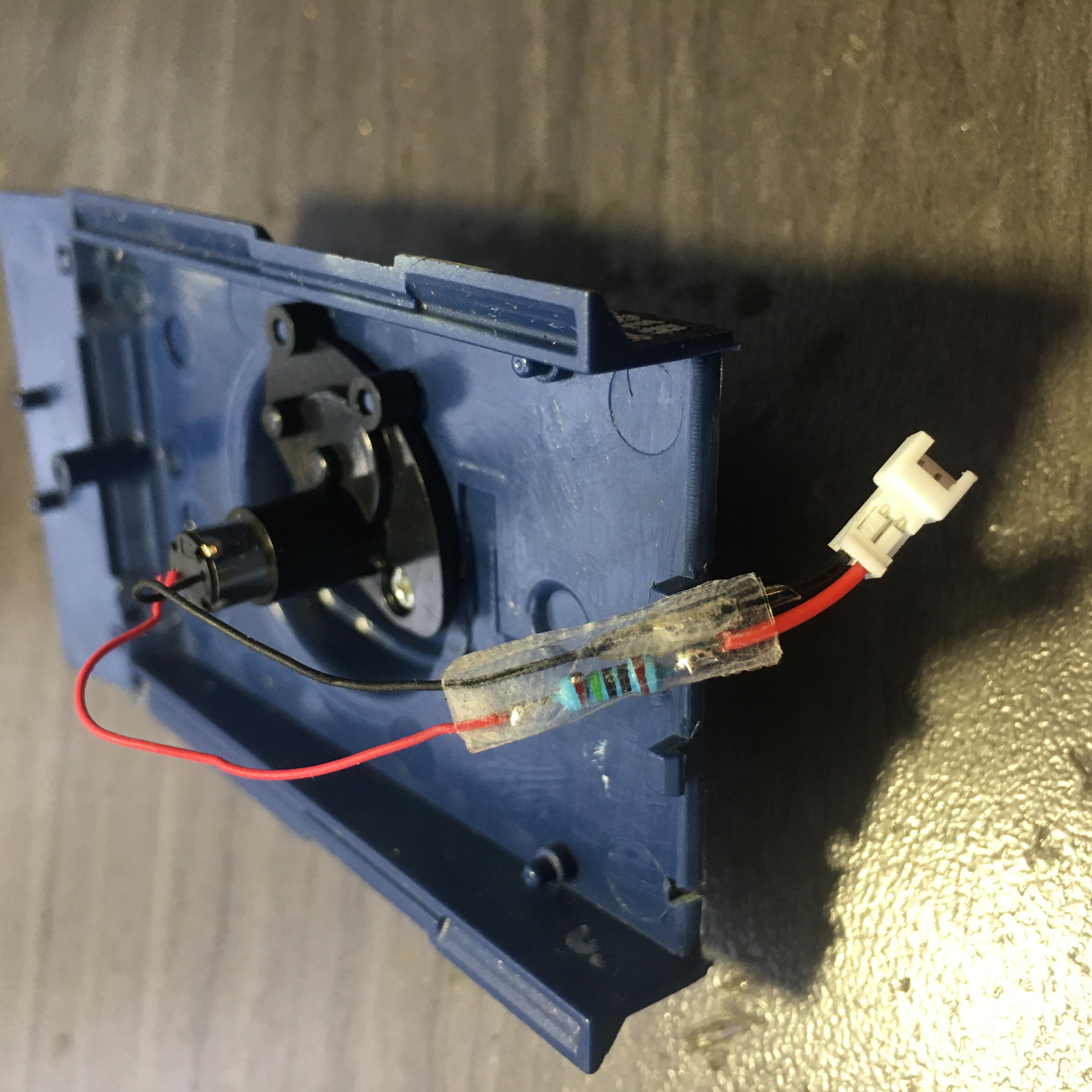 I added a 150 ohm 1/8 watt resistor in series with the supply voltage to the turret 8 ohm coreless motor. Also male micro JST connector added. Heat Shrink clear tape allows HI dielectric strength insulation of the added resistor and connector(s).