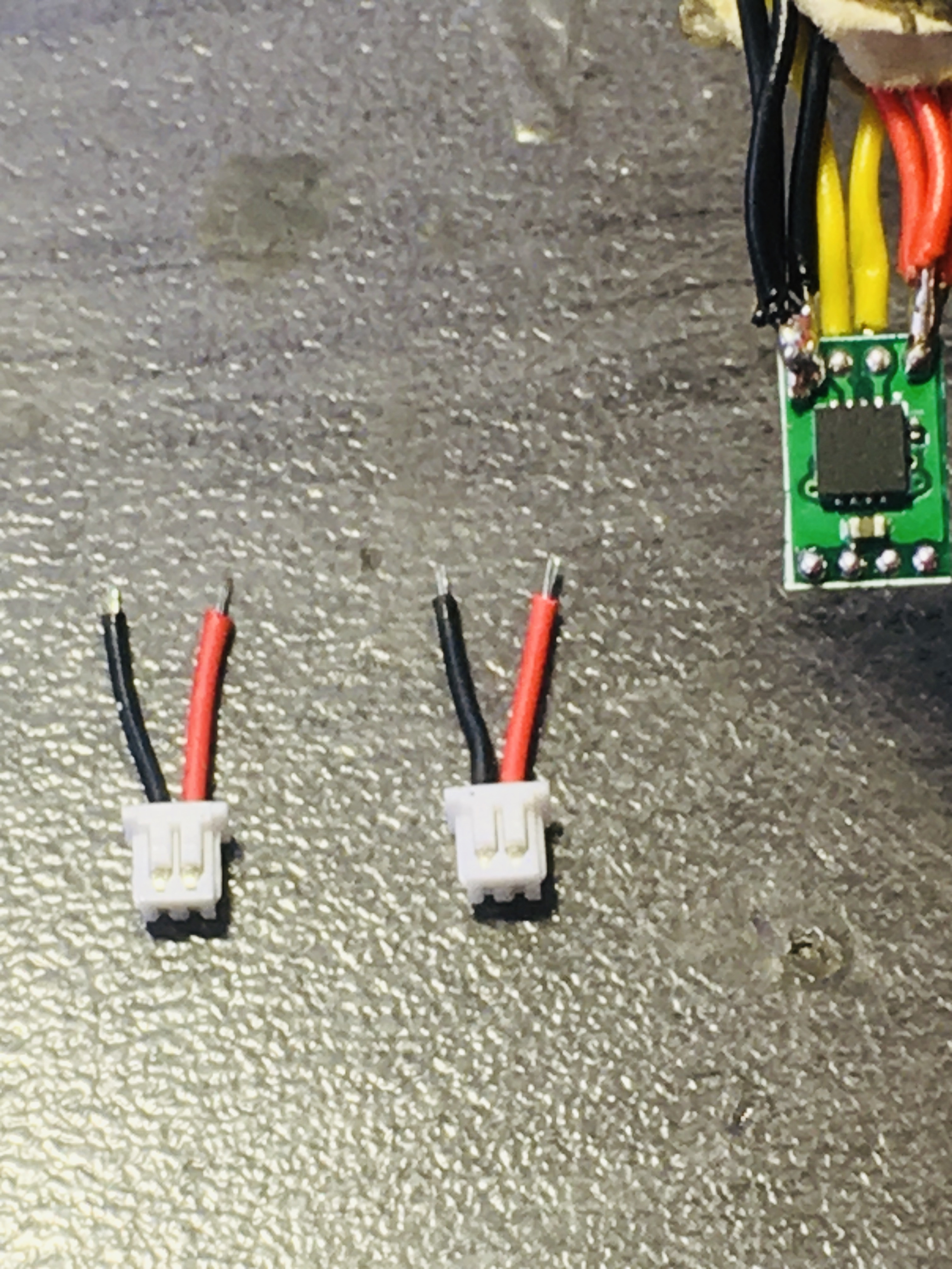 This is the OUTPUT side of the ESC. Those are 1.25 mm female micro JST connectors with 26 AWG wire.