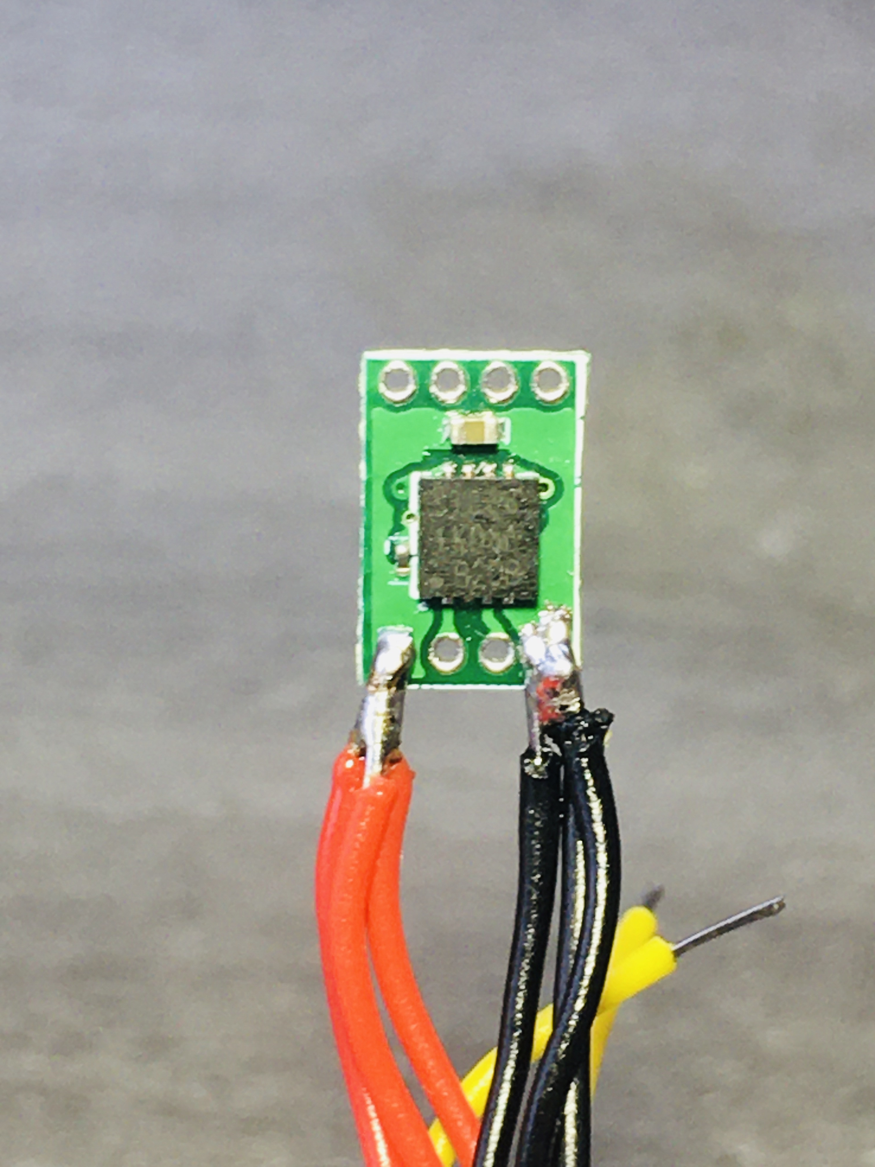 1s - supply voltage BLACK wires separately tinned then soldered together in parallel. The parallel BLACK wires are then soldered to the tinned pad on the right.