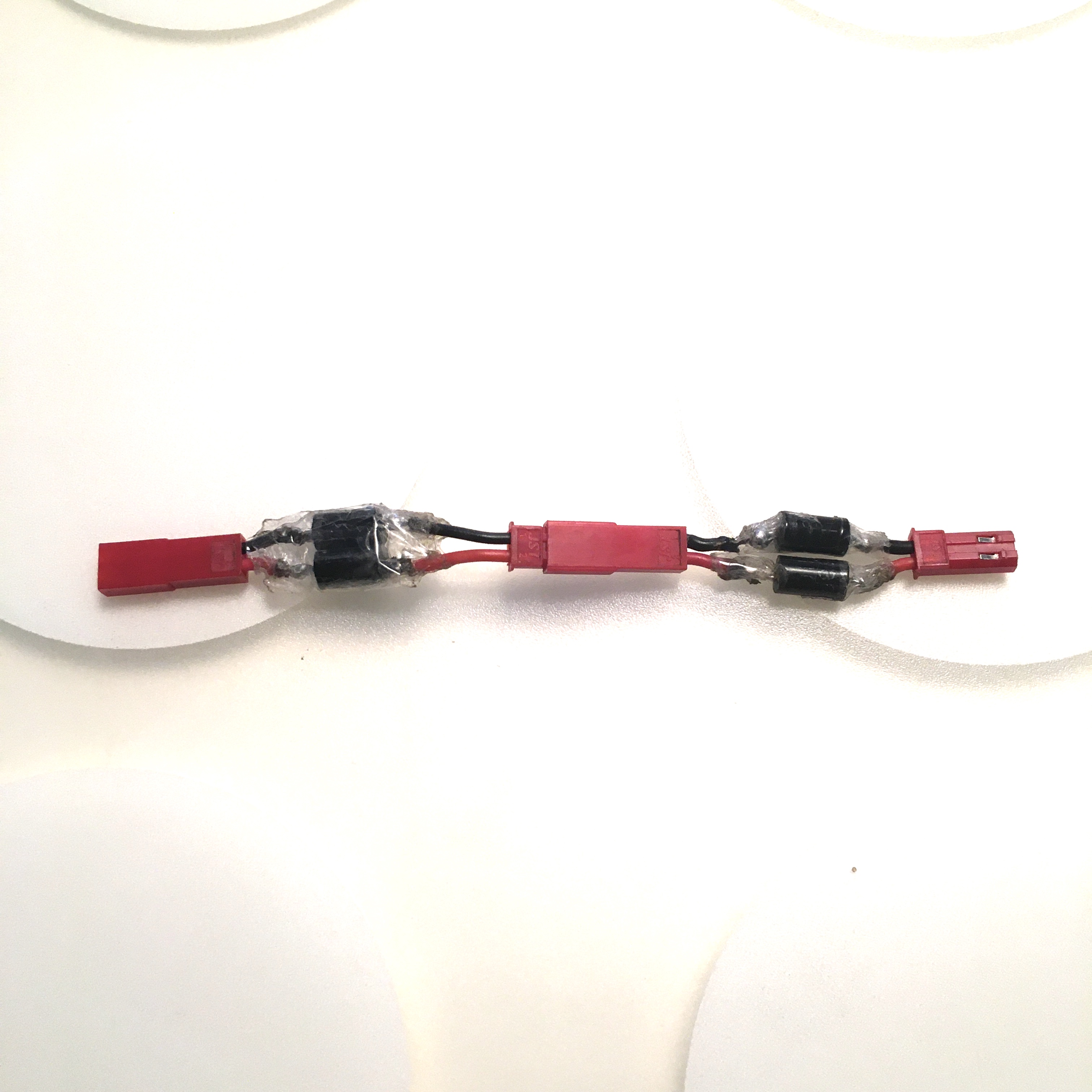 Connecting two diode pairs = 4 diodes in series voltage drop.