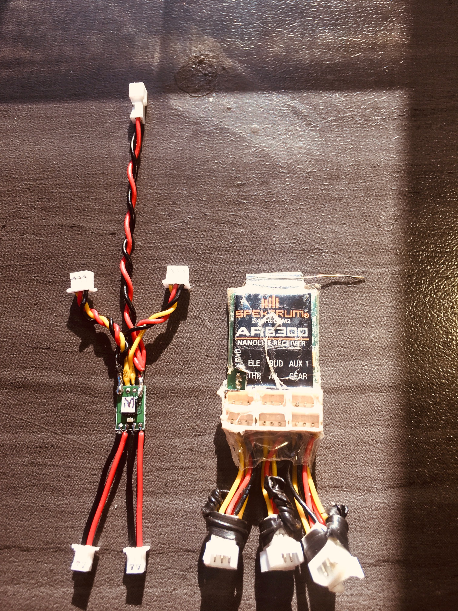 Latest ultra micro dual ESC\mixer with 6 channel AR6300 receiver. This one goes in the M60.