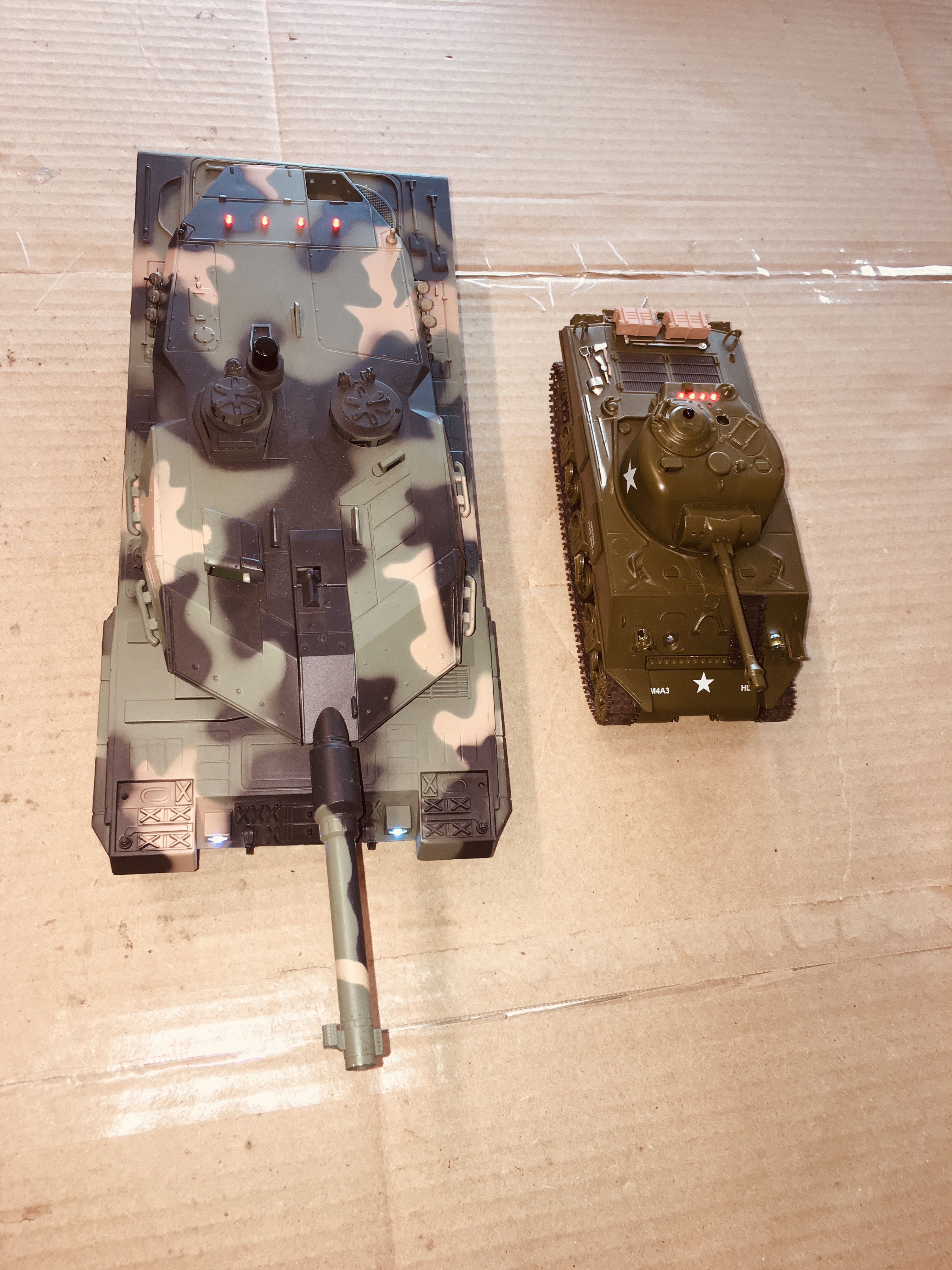 1/24 vs 1/30. The Tank controller board(s) are interchangeable between these two tanks. So what I have done here is mod the 1/30 Tank to 2s lipo. Works way better with 2s.