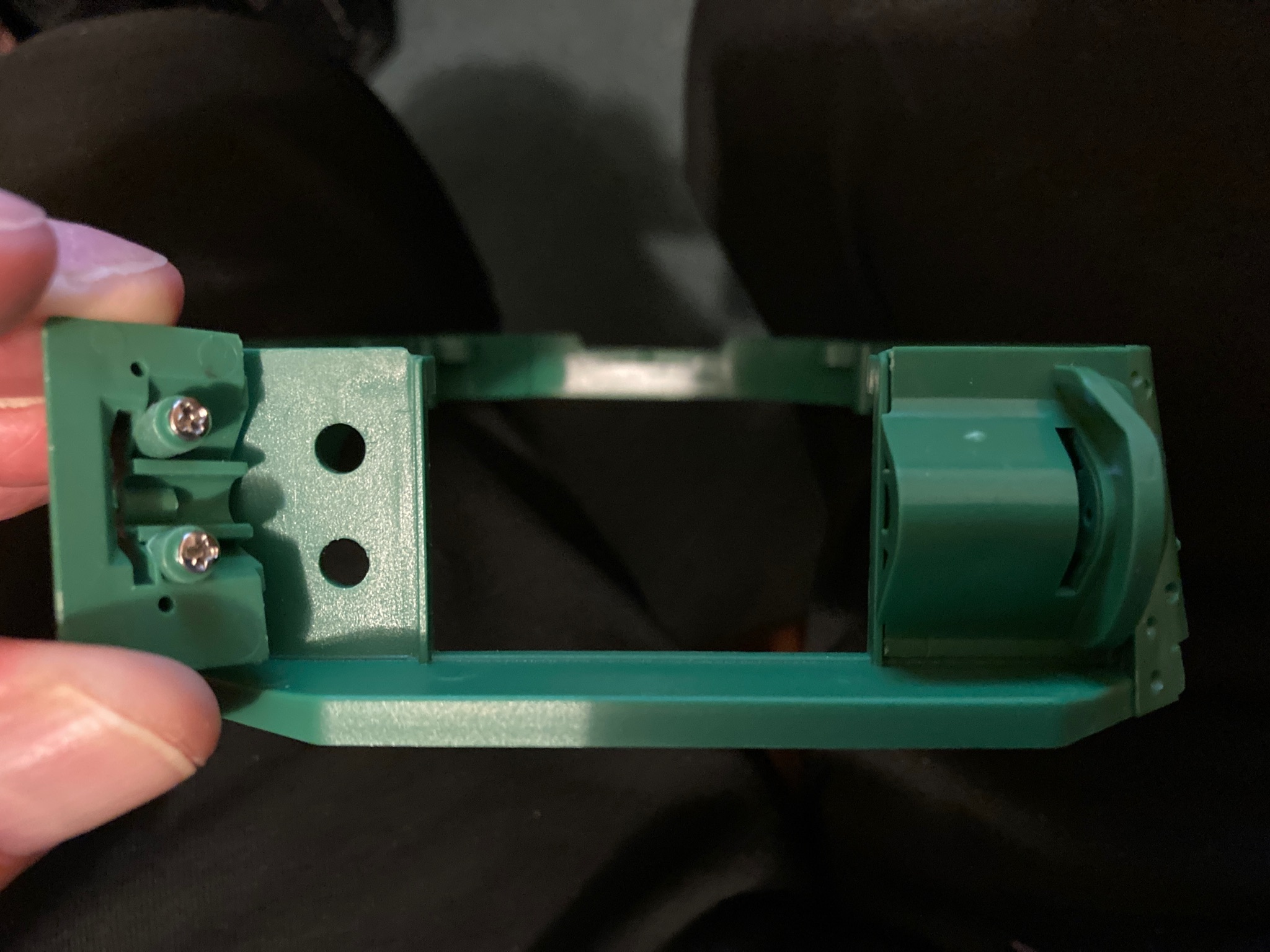 Screw heads smaller than the pillars - what holds them in?