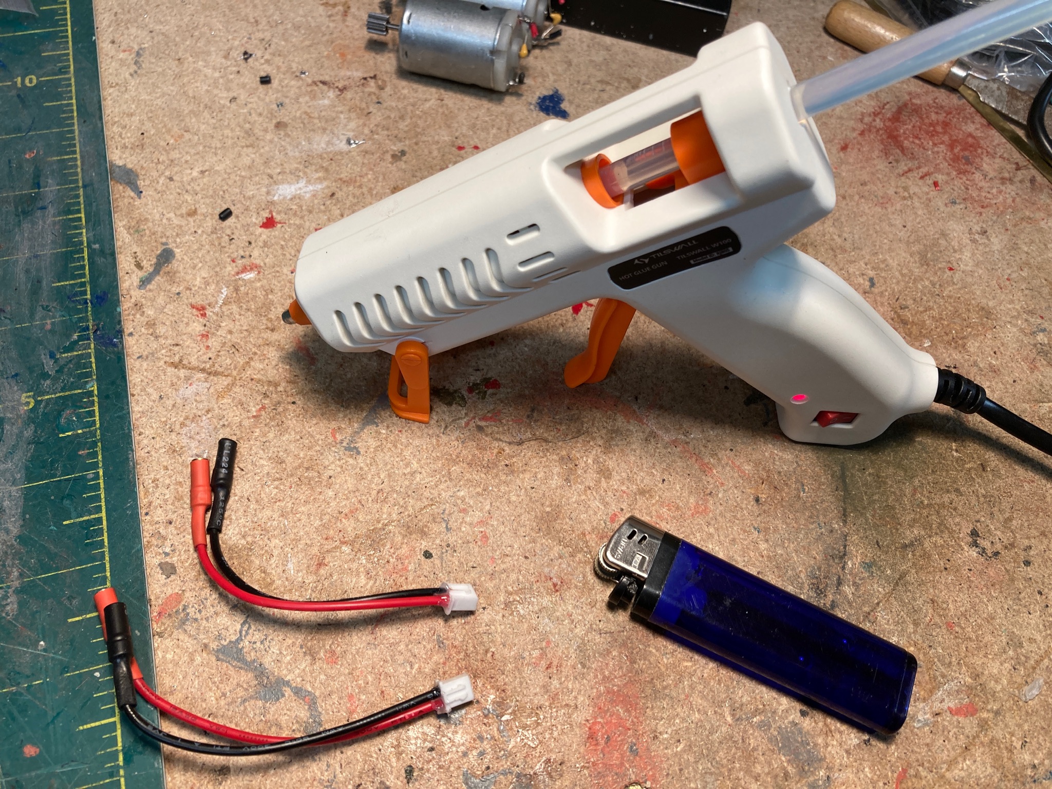 New hot melt gun next to my heat shrink device.