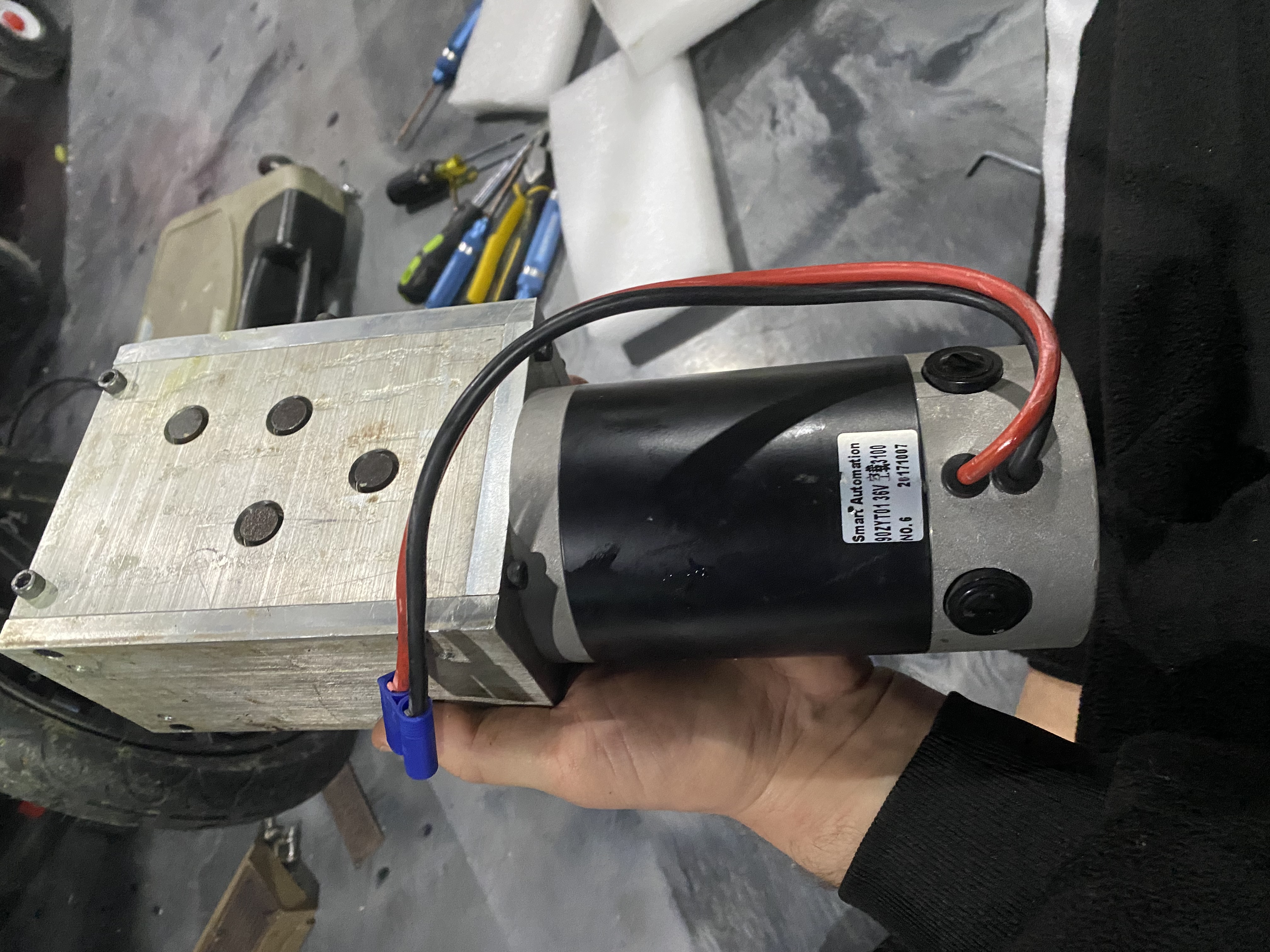 One of the two motors. I had to completely remove the to get the floor plate back on.