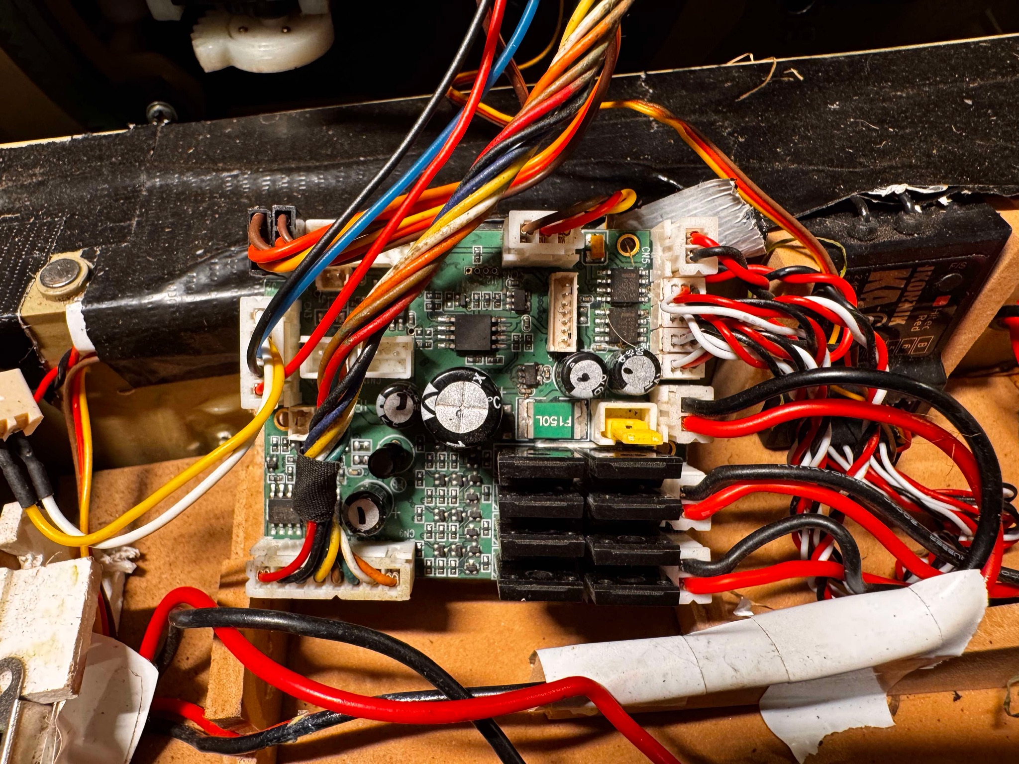The top view of the TK board next to the Hitec receiver.