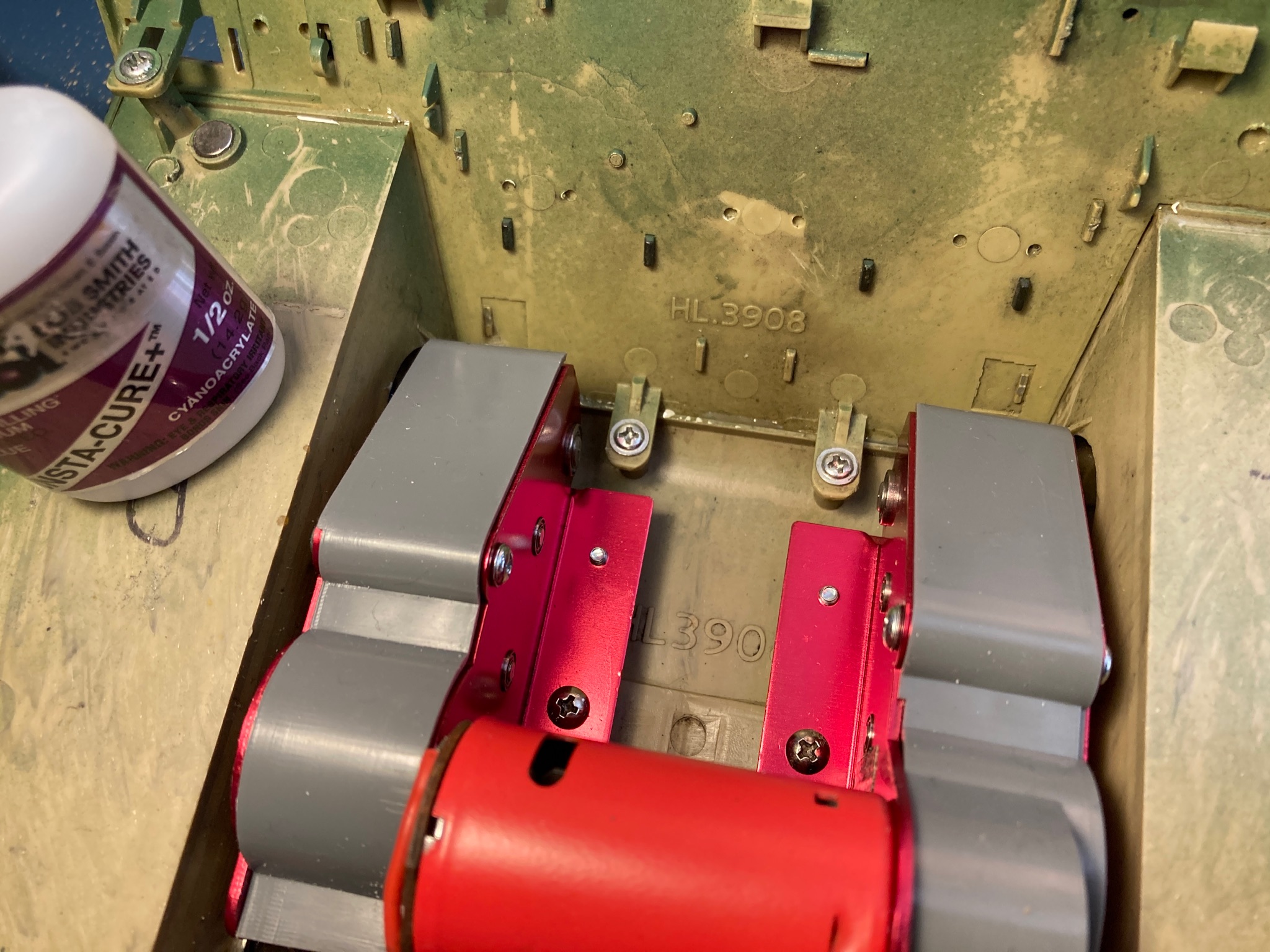 Rear hull plate glued and sealed. Gear covers also fitted.