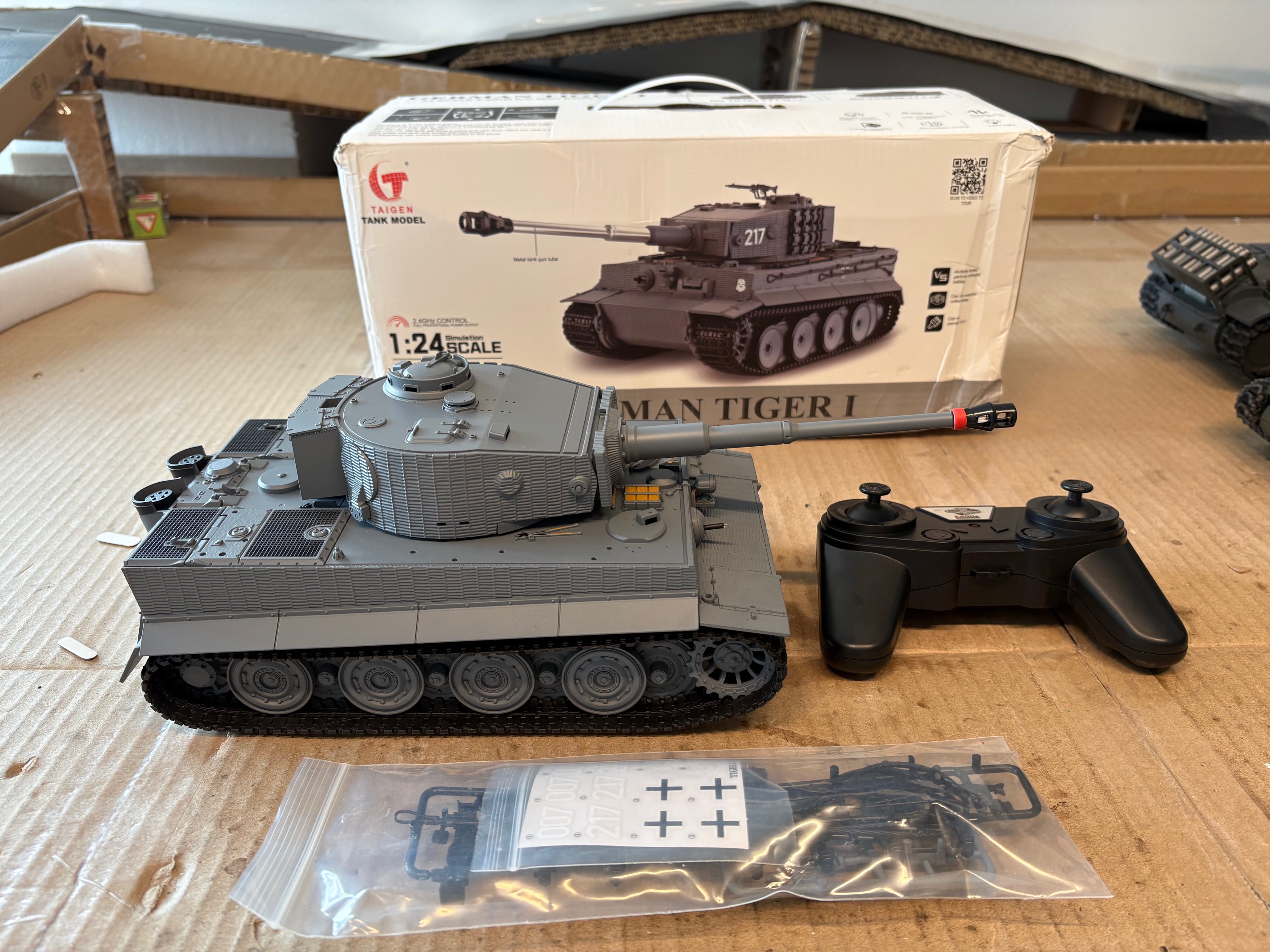 There is no metal barrel on this tank despite what it says on the box. That RED band on the muzzle is holding the rear of the muzzle together as it was broken in shipping. You can see the box took a pounding!