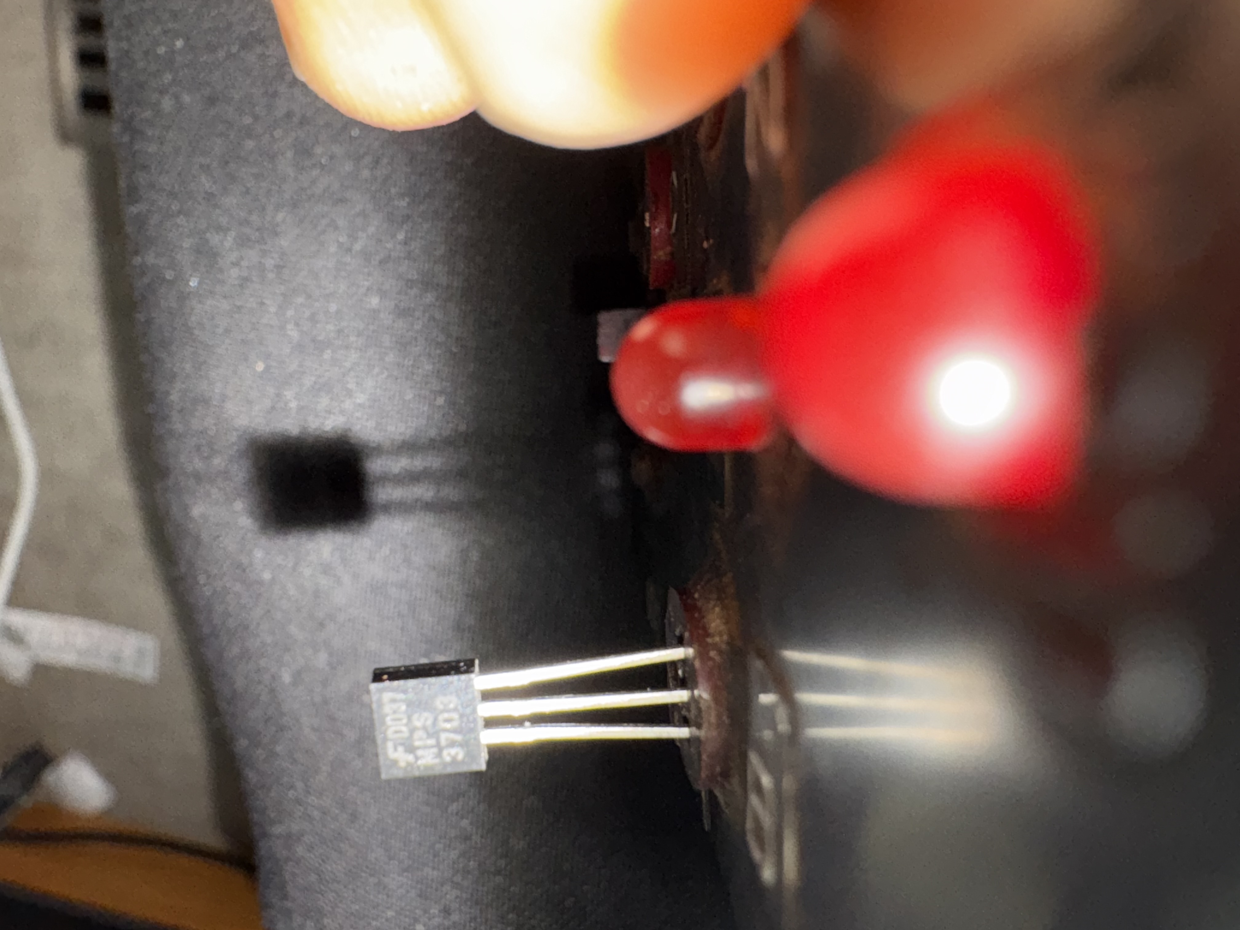 Trusty hand built transistor checker in use. PNP LED is on indicating this is a PNP transistor and that it is good to go.