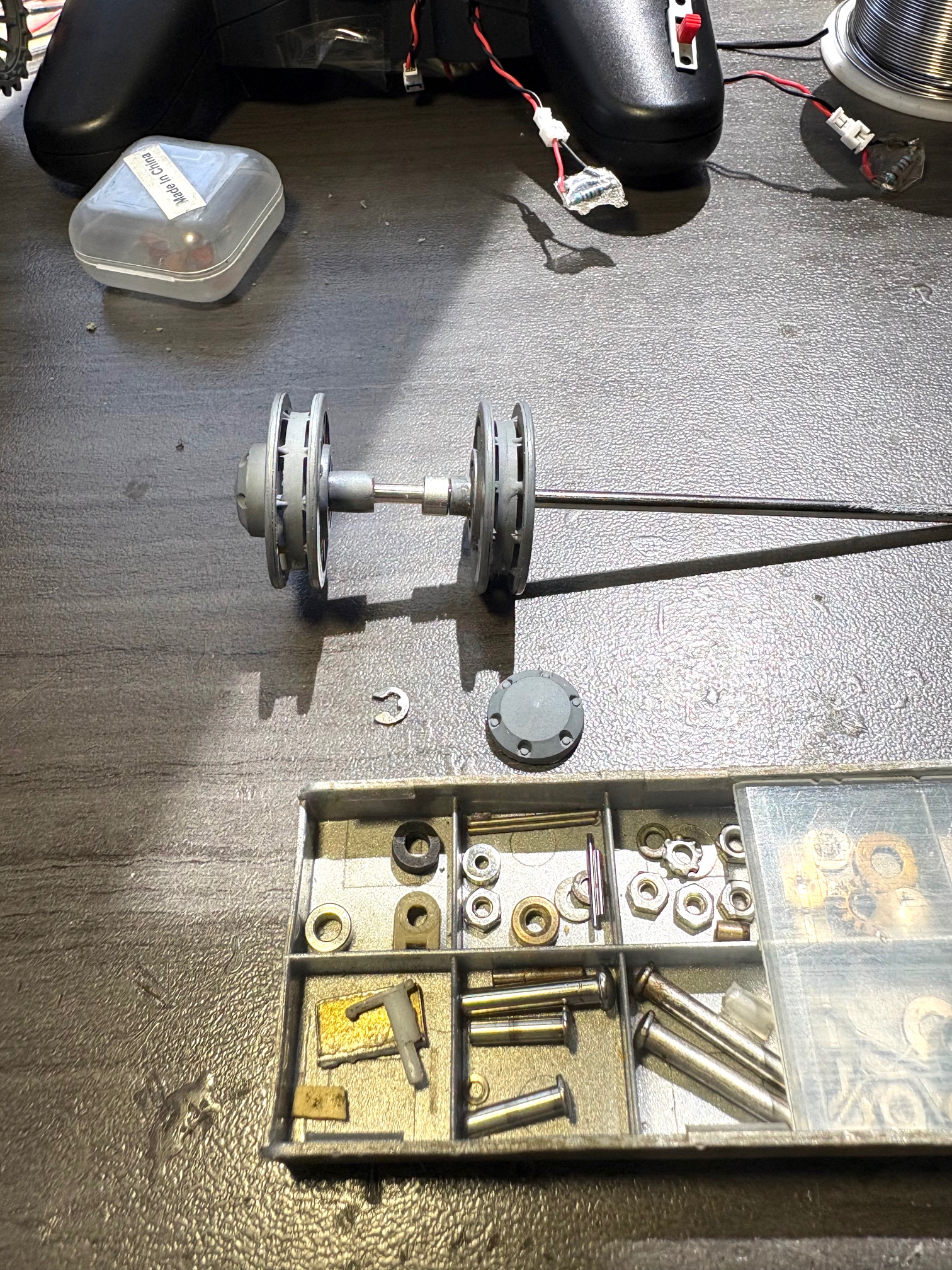 Aluminum spacer replaces the idler wheel plastic axle  sleeve chunk removed when pulling the idler wheel.