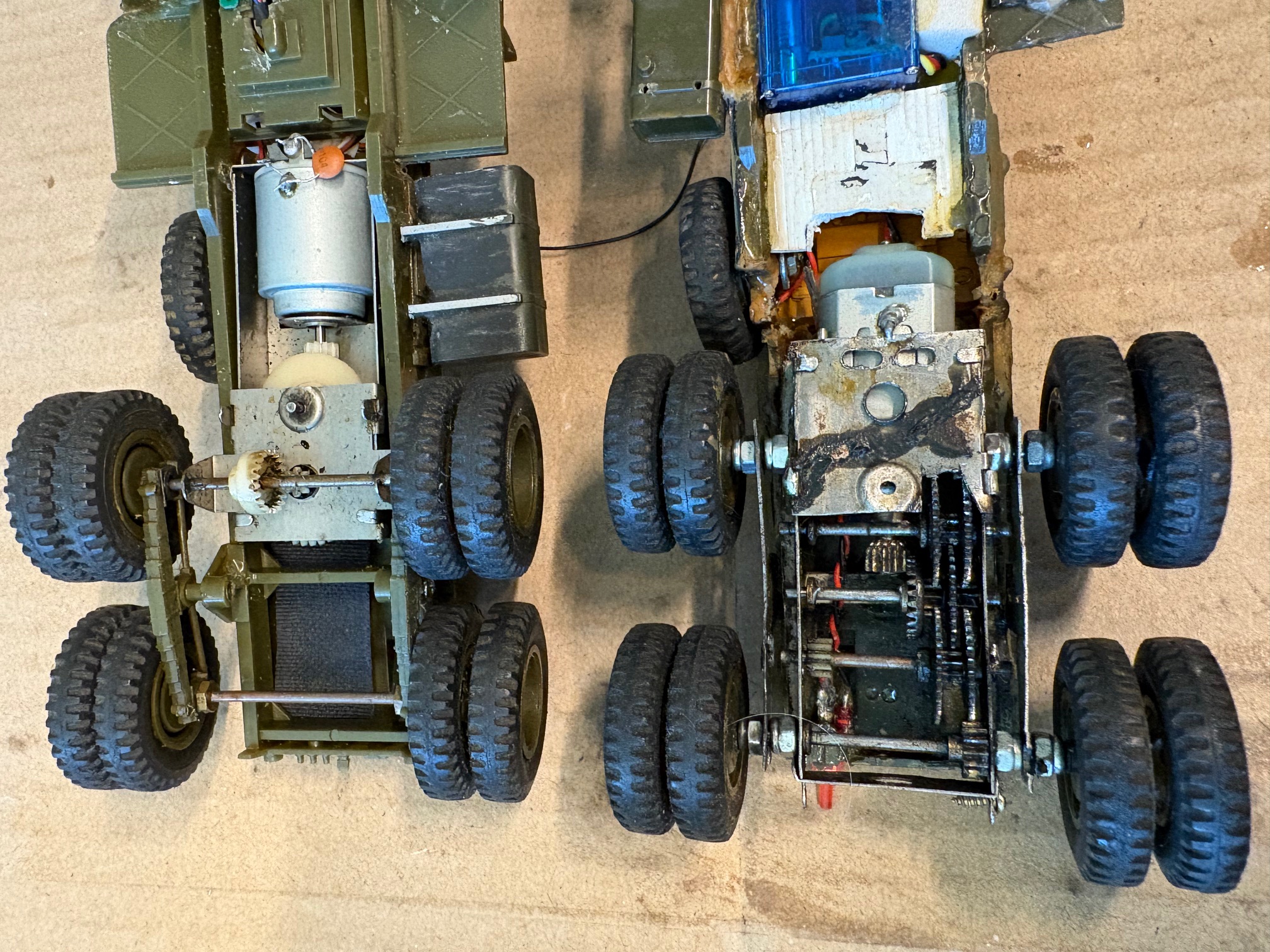 Gearbox at the bottom of the picture was converted to 4WD using the original metal 2WD frame. 42 years ago. Still work quite well. with its all metal construction.