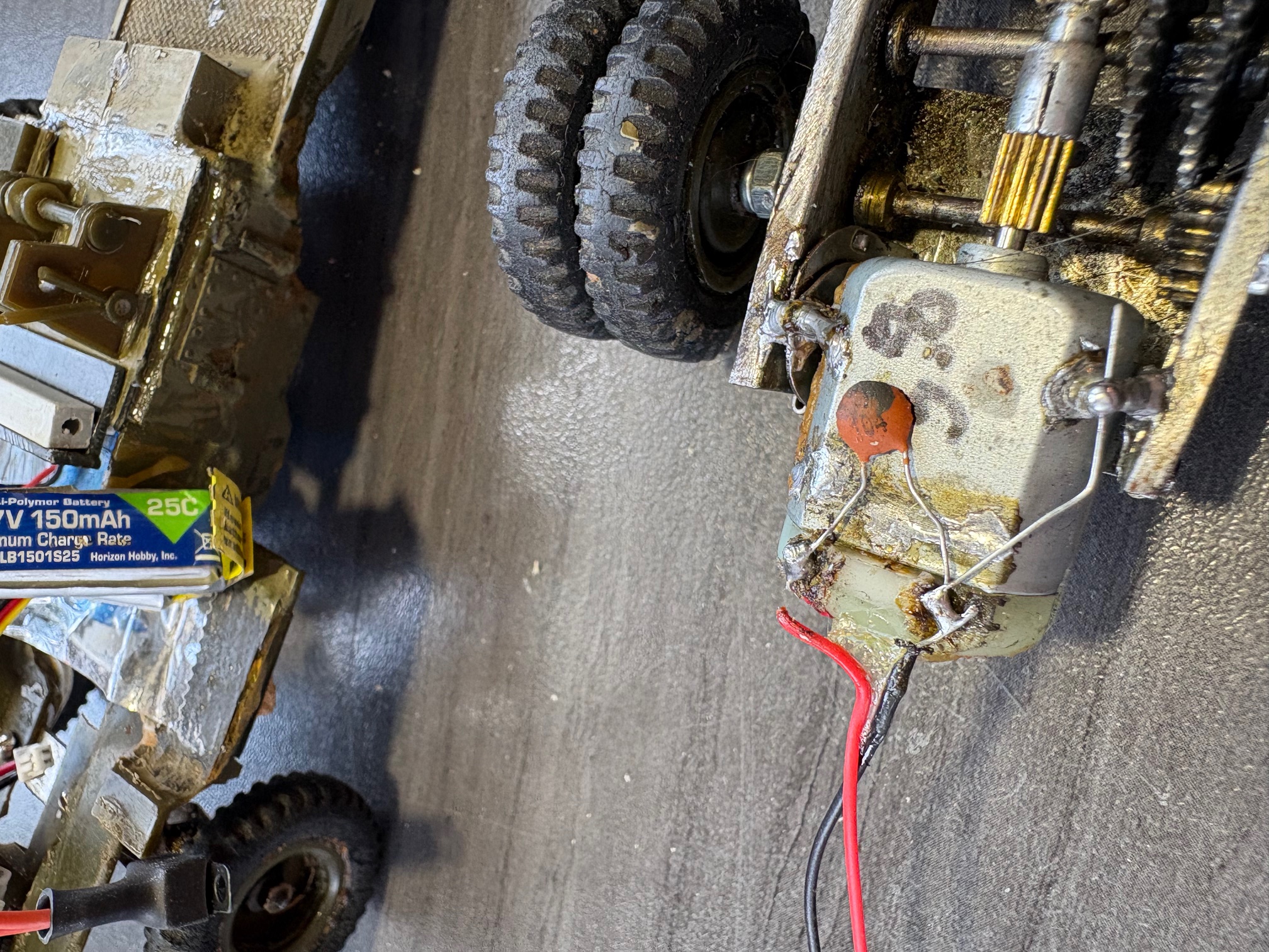 Here is why it took so long to do a video. Red wire is broken. The other wire has a solid wire going to the metal frame and the frame of the motor. This eliminates electrical noise from the moving metal parts which can cause RF glitches in receivers.