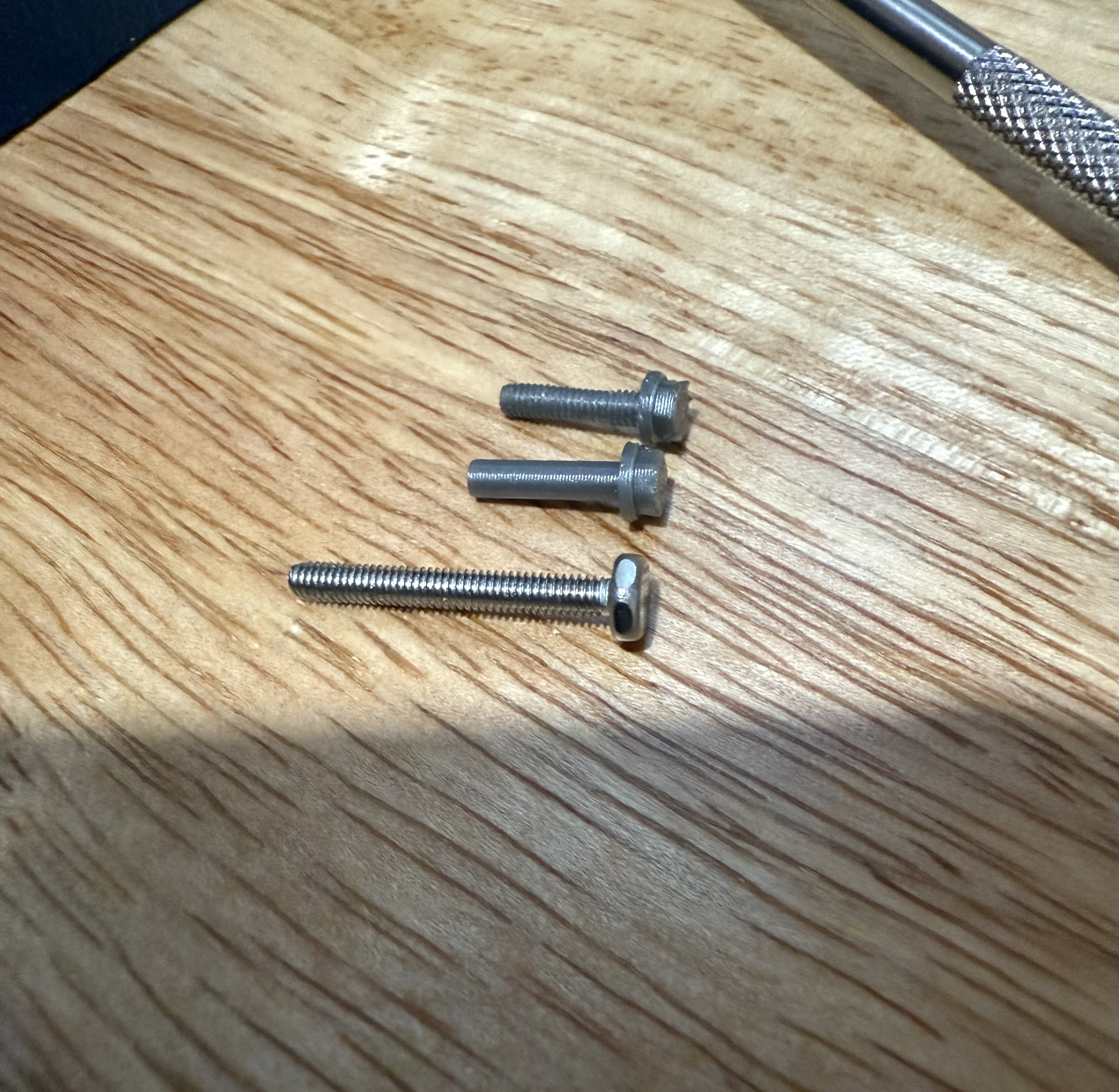 Top: threaded fake bolt<br />Middle: Fake bolt fresh off the press<br />Bottom: Actual 2.5mm hex bolt