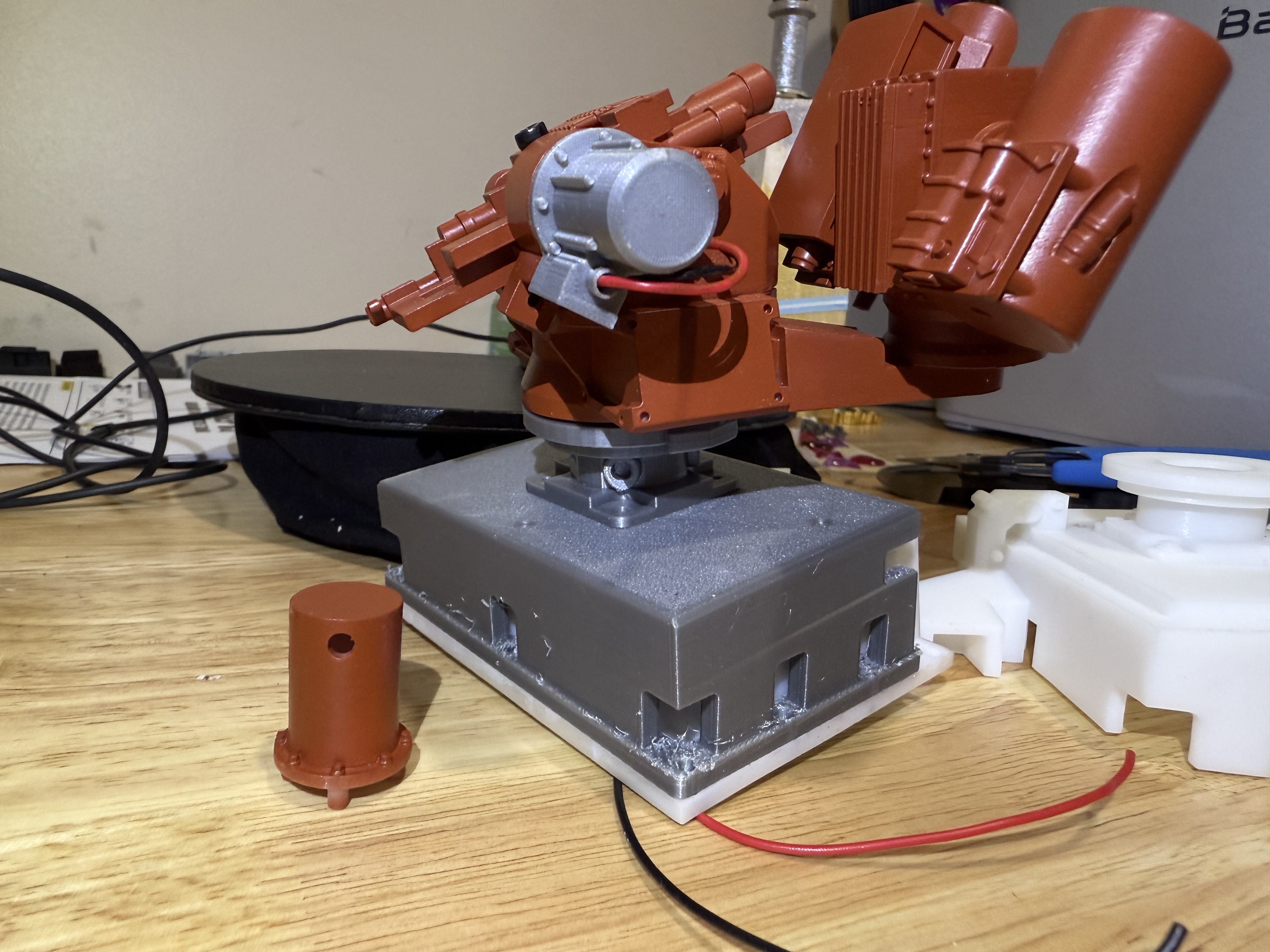 The old motor cover in red and the the one I designed in silver