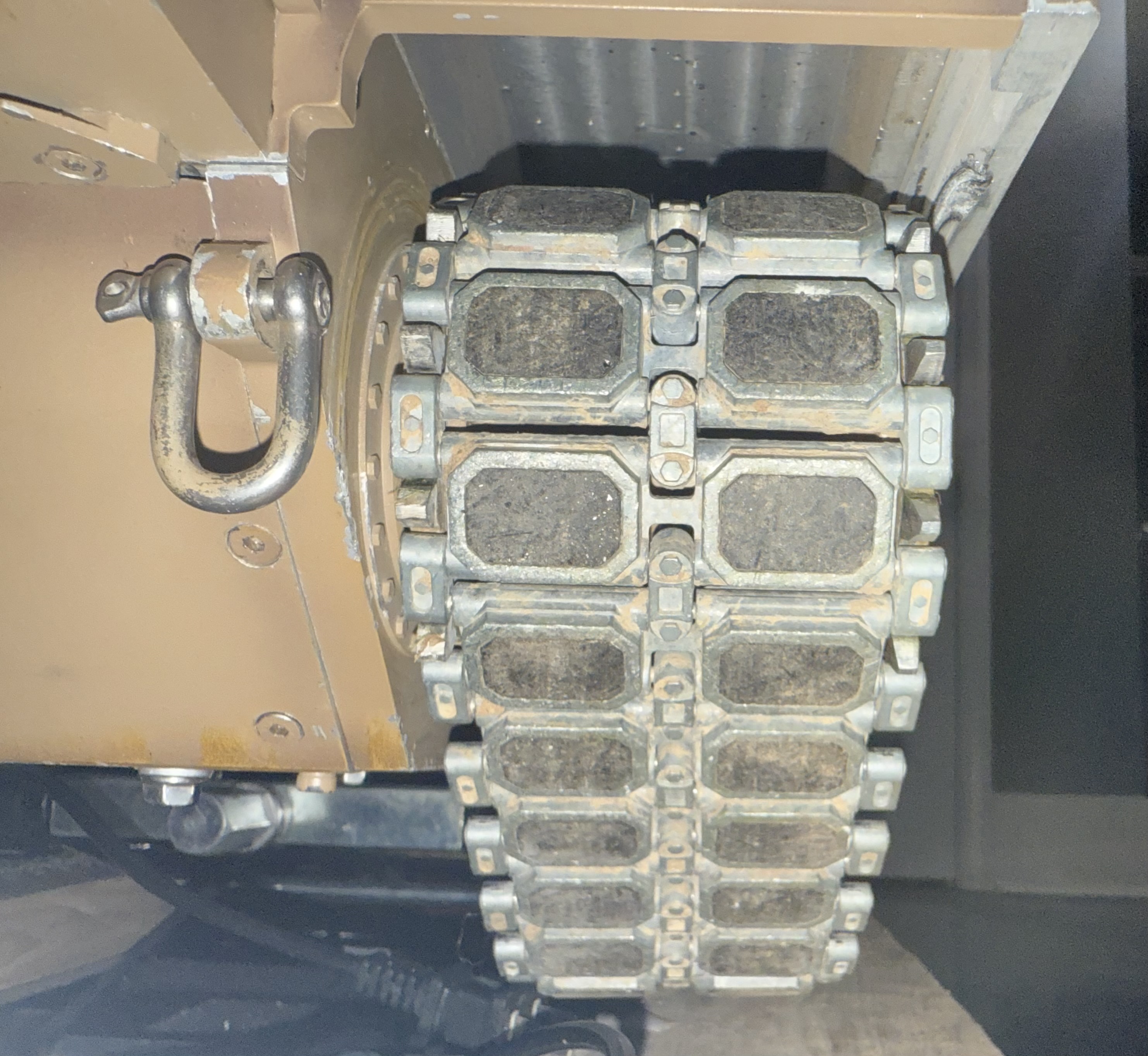 Part of the track pads is actually part of the metal part of the track link, instead of the whole “pad” being rubber