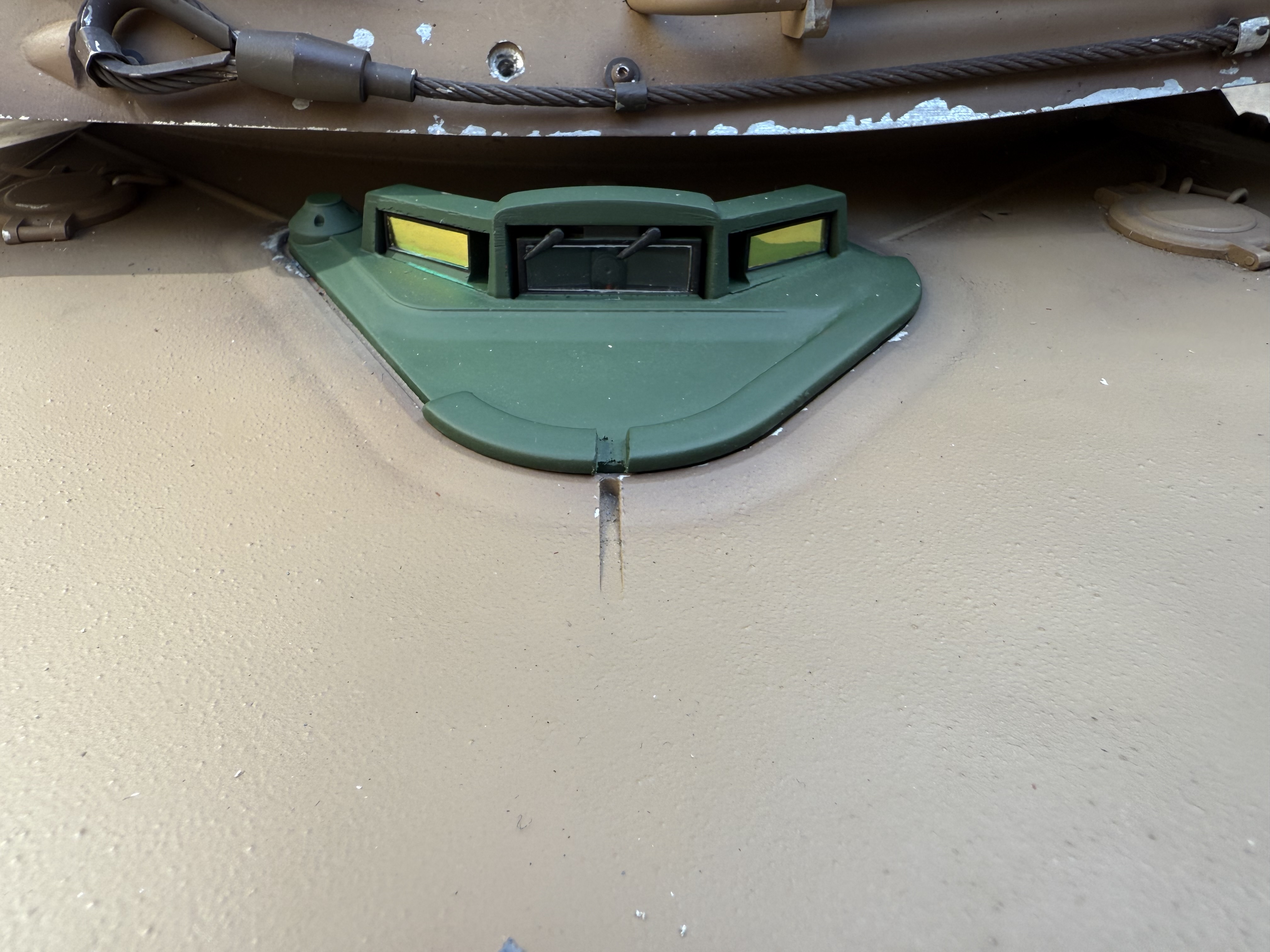 Similar to the dog house, I did clear Lexan for the main drivers periscope with the camera, and reflective photo paper or whatever it’s called for the side periscopes