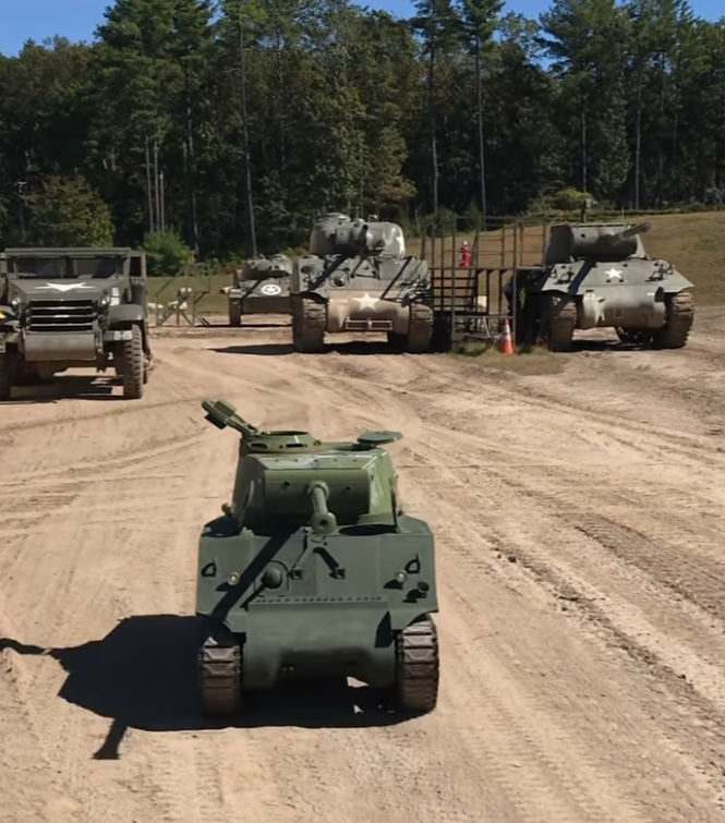 Drove my Sherman at the American Heritage Museum Parade ground next to the real McCoy.
