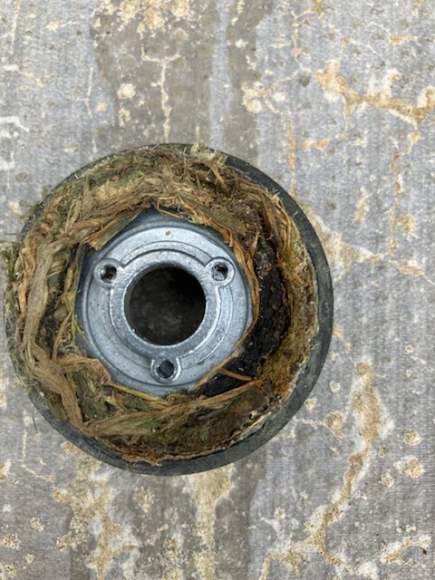 Dirt packed in road wheels.