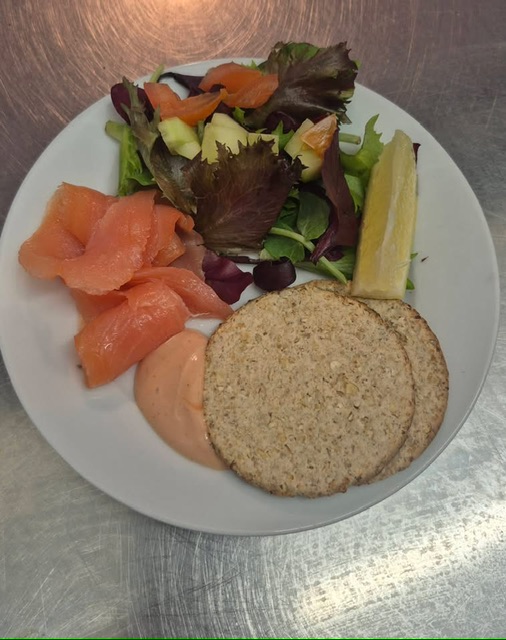 Beautifully presented salmon, by  the cooks.