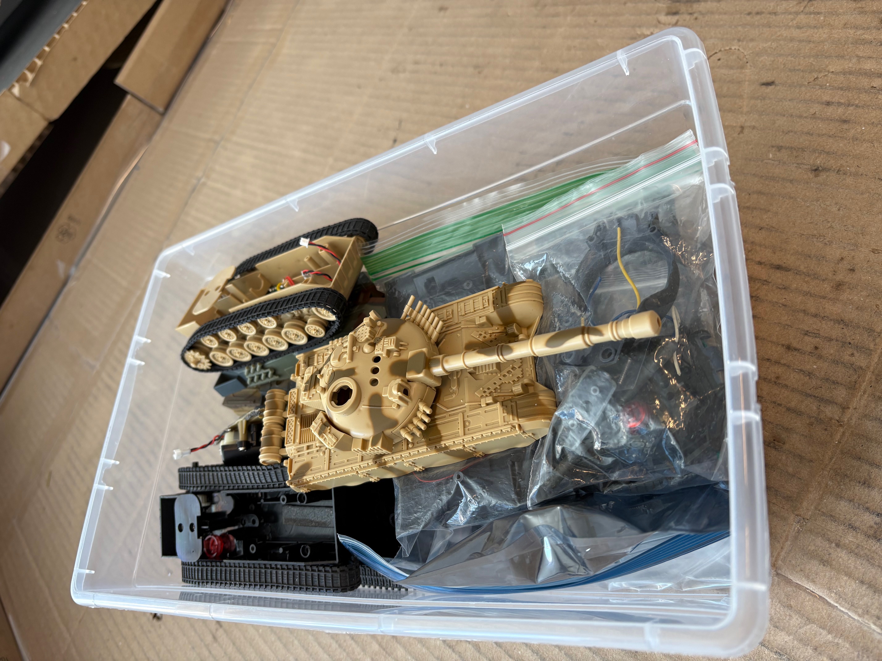 Salvage yard of parts in a box.