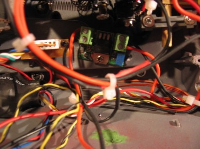 Here is my voltage regulator. Power/ground input and power ground output. Looks like a switching regulator. very stable output and works great.  Board says IRU-001  but I don;t remember where I got it. I think from a robot supply store.