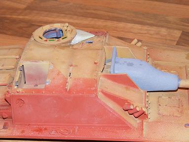 Reshaped mantlet and shot deflector