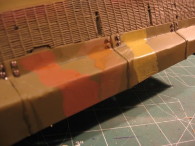 experimenting with color...panzer yellow/ testors dirt brown, and testors red earth ...all over olive base