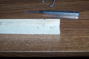 Jig and punch with completed spring.