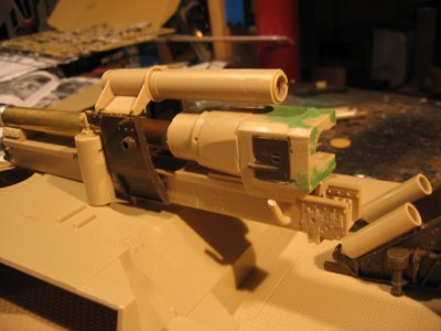 modified and reversed breech block and slide mechanism and cut for flash wiring; recovery tube on top will be cut to correct length and another cylinder added on left side.