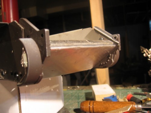 I don't need the tammy motor grooves in the hull so covered with sheet aluminum tucked and epoxied to upper hull lip (inside another aluminum u channel) and the bolted to bottom w/some epoxy to hold it all together. A little milliput and all will be well...