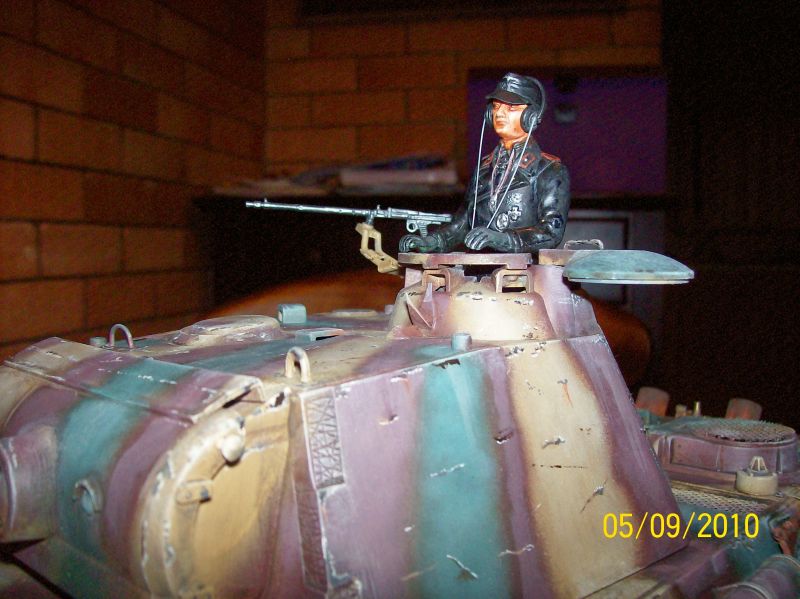 tank commander fitted,just using blue tak to hold him in,still gotta paint his ear phone cable's