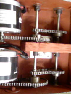 This picture shows the gearing system. It gives about an 11:1 reduction which provides enough torque to allow it to climb 40-50 degree mud slopes easily.