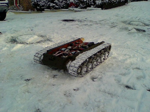 A brief stop for a photo opportunity. She was rolling through the snow with no trouble at all. The circle in the snow just above her, was made when I did several neutral turns in succession, OK! I was showing off to my 2 boys!!