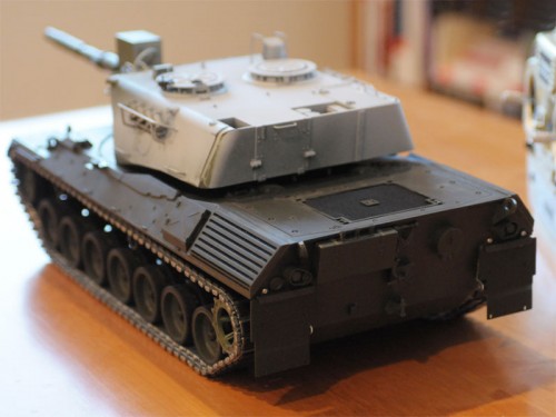The new kit parts are a new metal screen that sits on top of the old molded plastic texture in a new plastic frame.