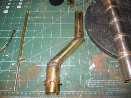 Primary exhaust stack from boiler had to be re-directed to keep scale appearance...it will empty up into obove metal stack.
