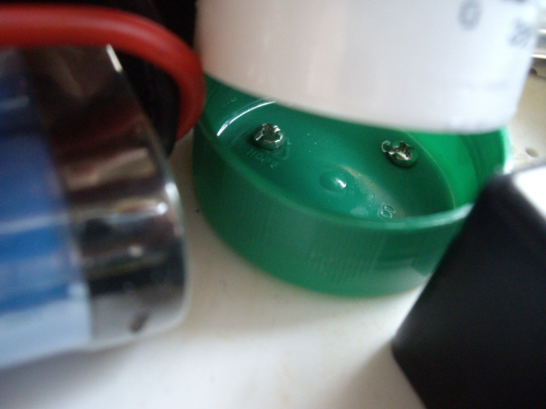 Mounting cup, plastic milk bottle lid