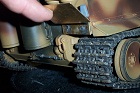 Right side lifted to show soldered brads to hold it in place.