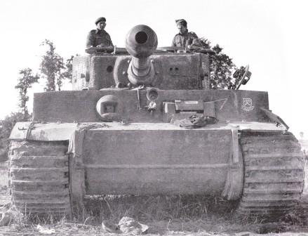 Business end of Tiger 334 being inspected by some Brits - note spare track rail made from tubing.jpg